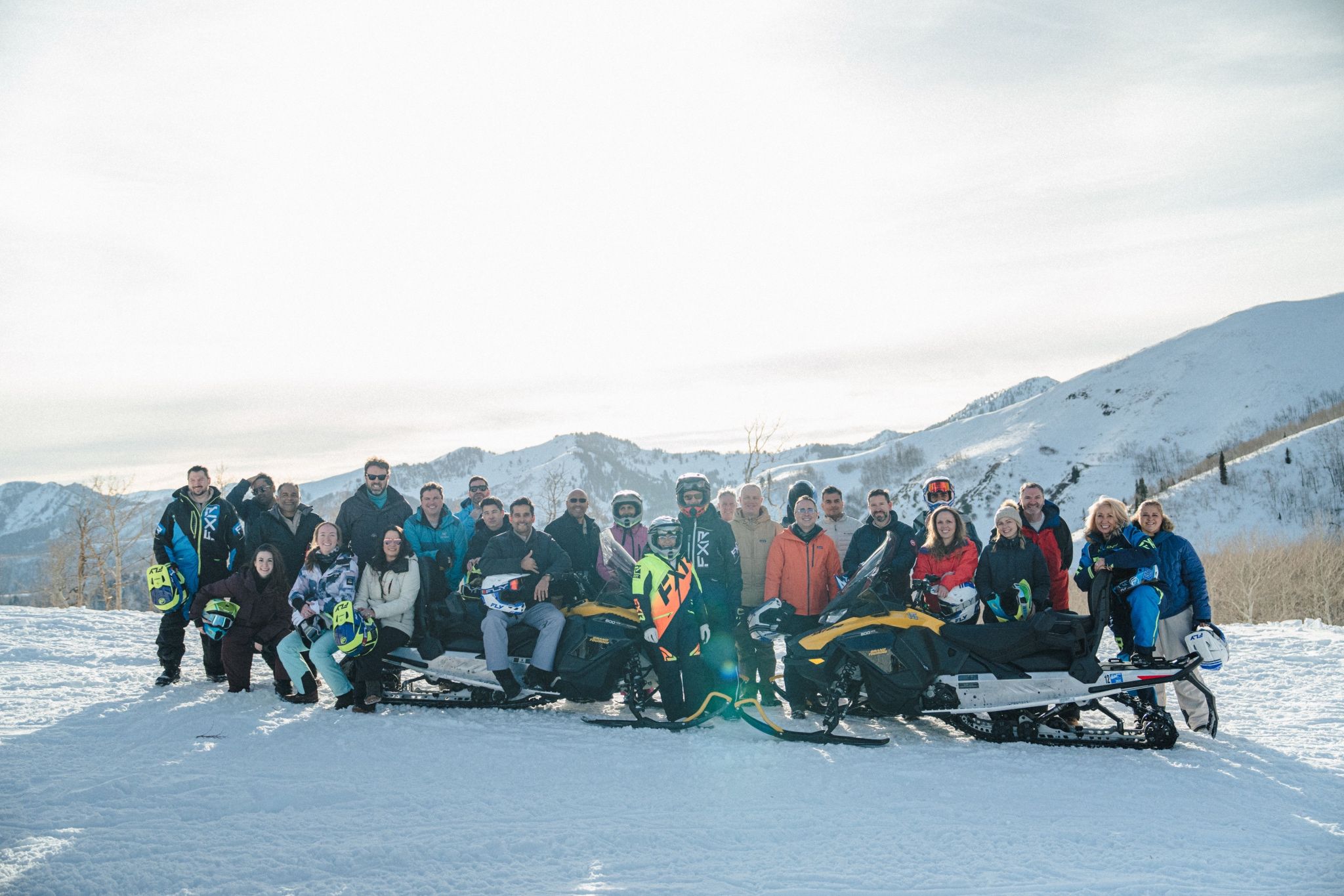 AI Summit at Sundance — group on snowmobiles in the mountains